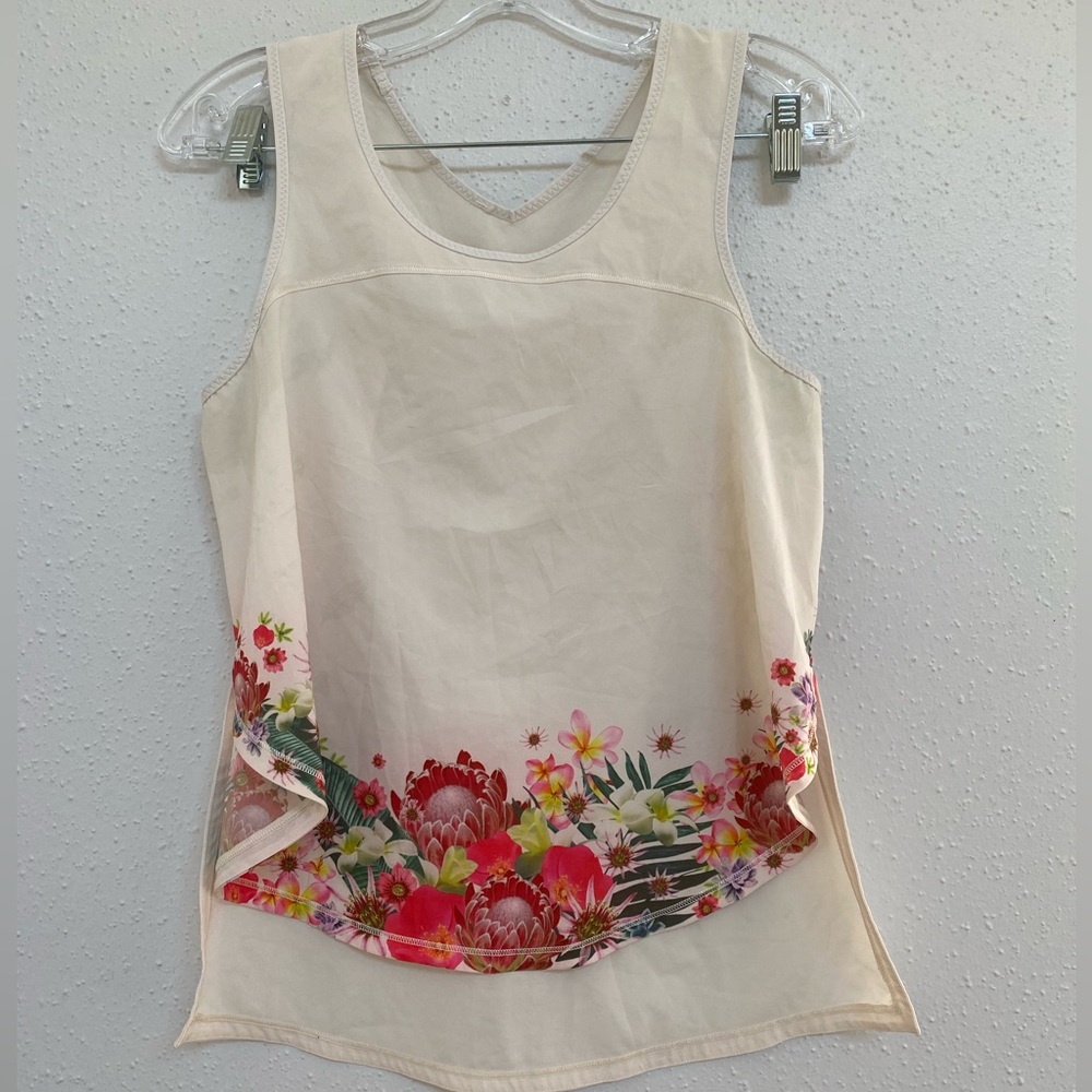 Lululemon white tank top with floral prints on the bottom Sz SMALL (VINTAGE)